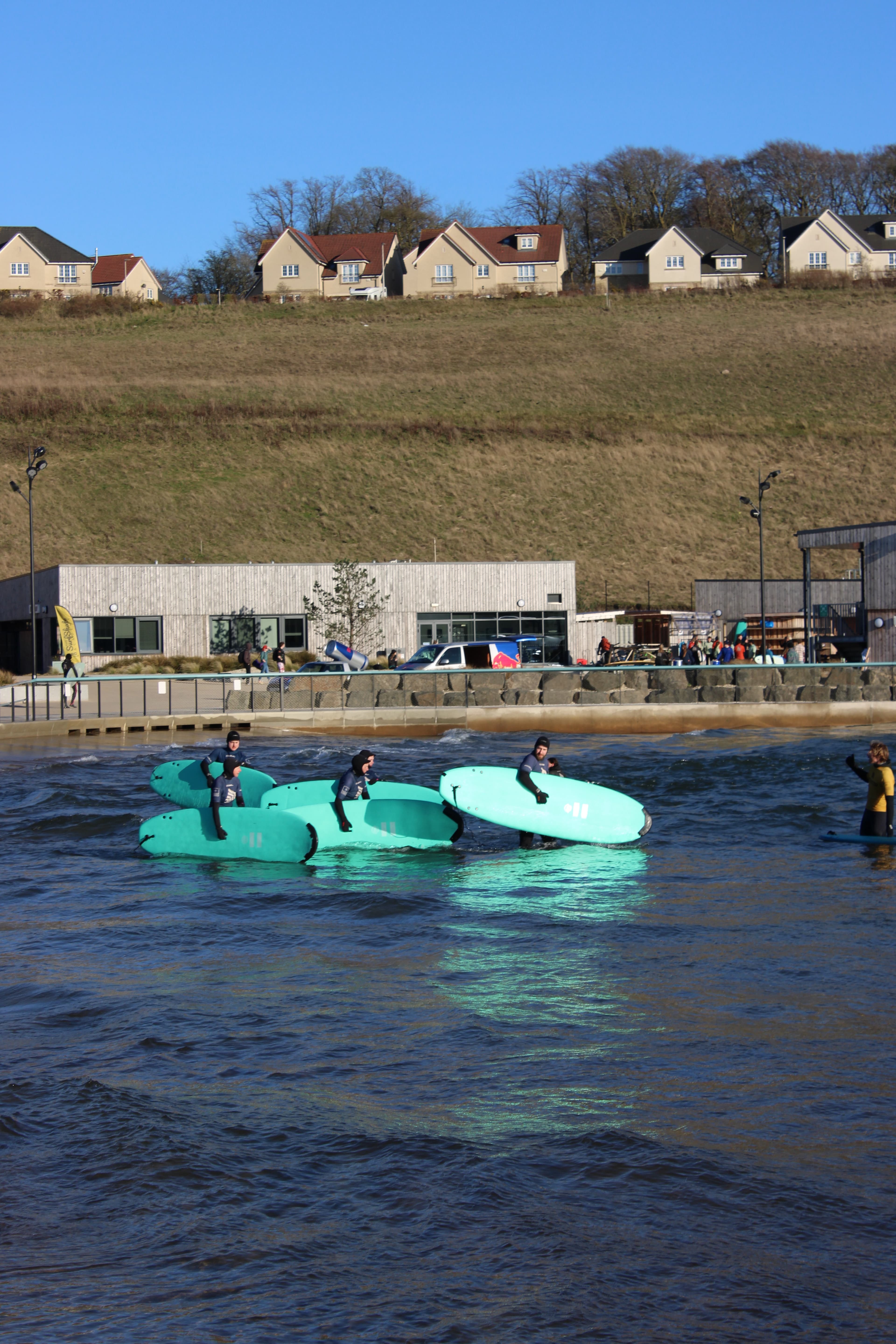 Surf club members at a local beach